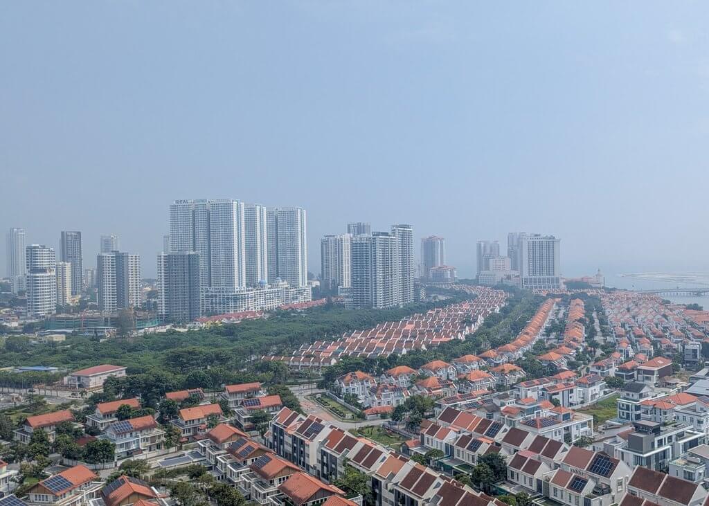 Hazy skies in Penang, August 2026. On clear days you can see the islands in the sea beyond the buildings.